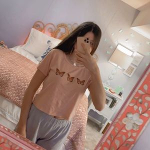 Urban outfitters. Peach butterfly shirt